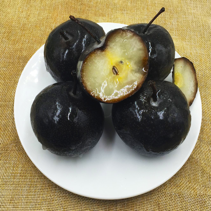 东北冻梨：黑色冰壳下的甜蜜爆破——自然馈赠与文化传承的冬日密码